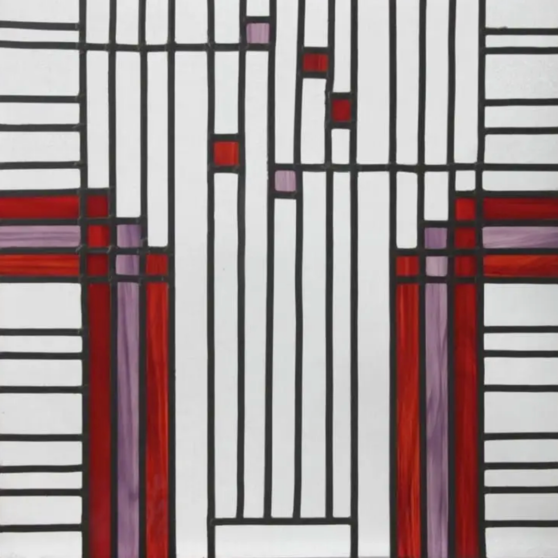 My first stained glass window. Modern, verticality. Abstract flowers in field. red, purple and transparant glass.